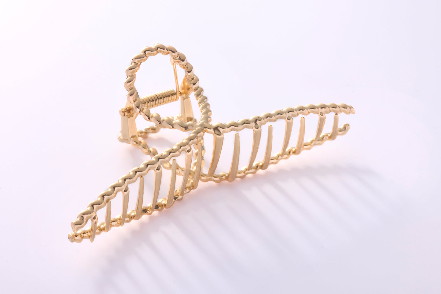 Dekorative Haarspange Gold mit geflochtenem Design